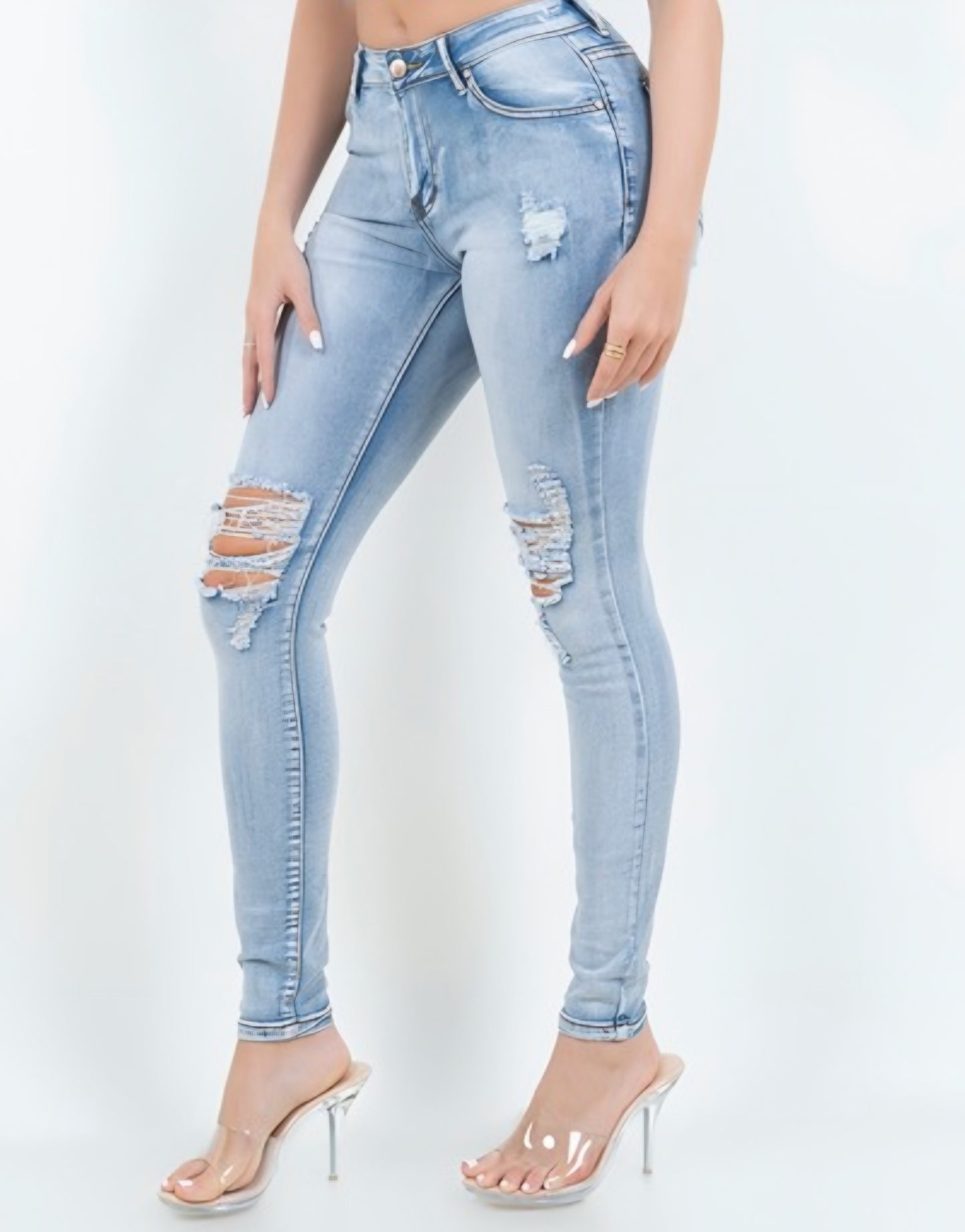 674 Light Wash Distress Skinny Jeans