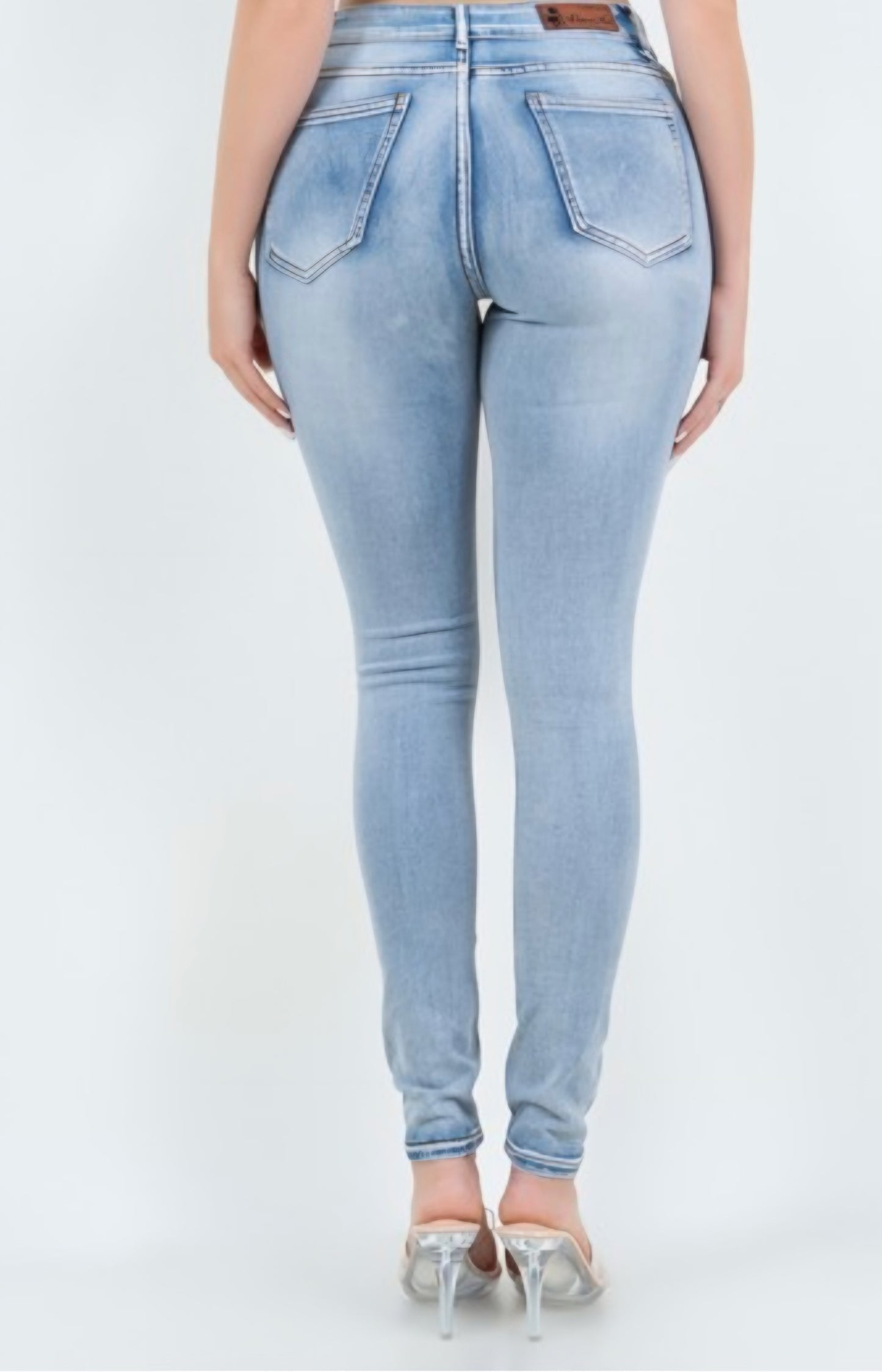 674 Light Wash Distress Skinny Jeans