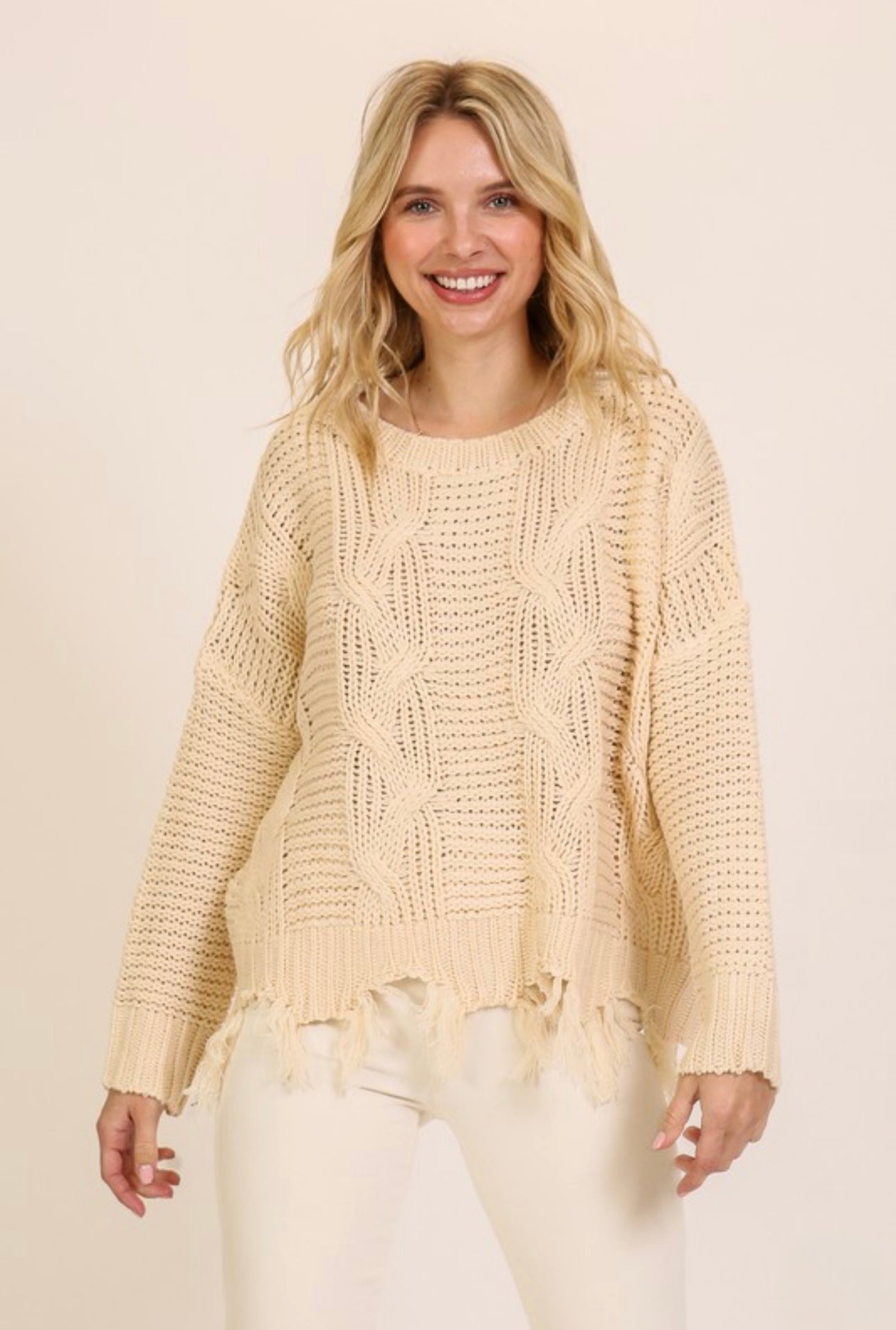 Cable Knit Tassel Hem Sweater