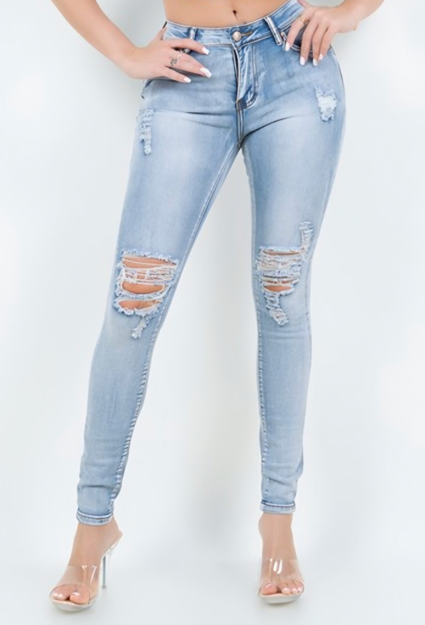 674 Light Wash Distress Skinny Jeans
